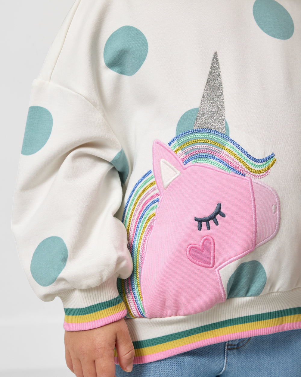 Close up of the unicorn graphic on the Unicorn Drop Shoulder Crewneck