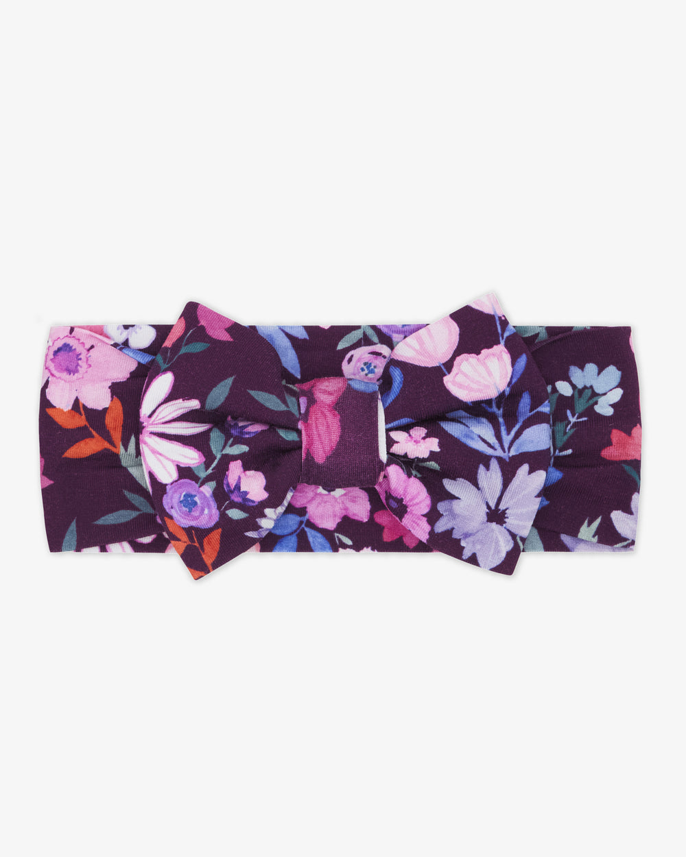 Flat lay of the Violet Meadow Luxe Bow Headband