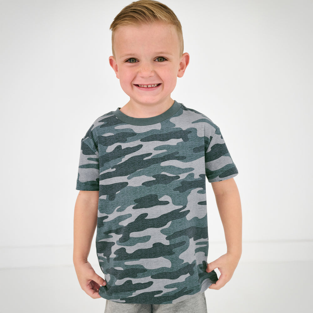 Close up of child wearing the Vintage Camo Short Sleeve Relaxed Tee