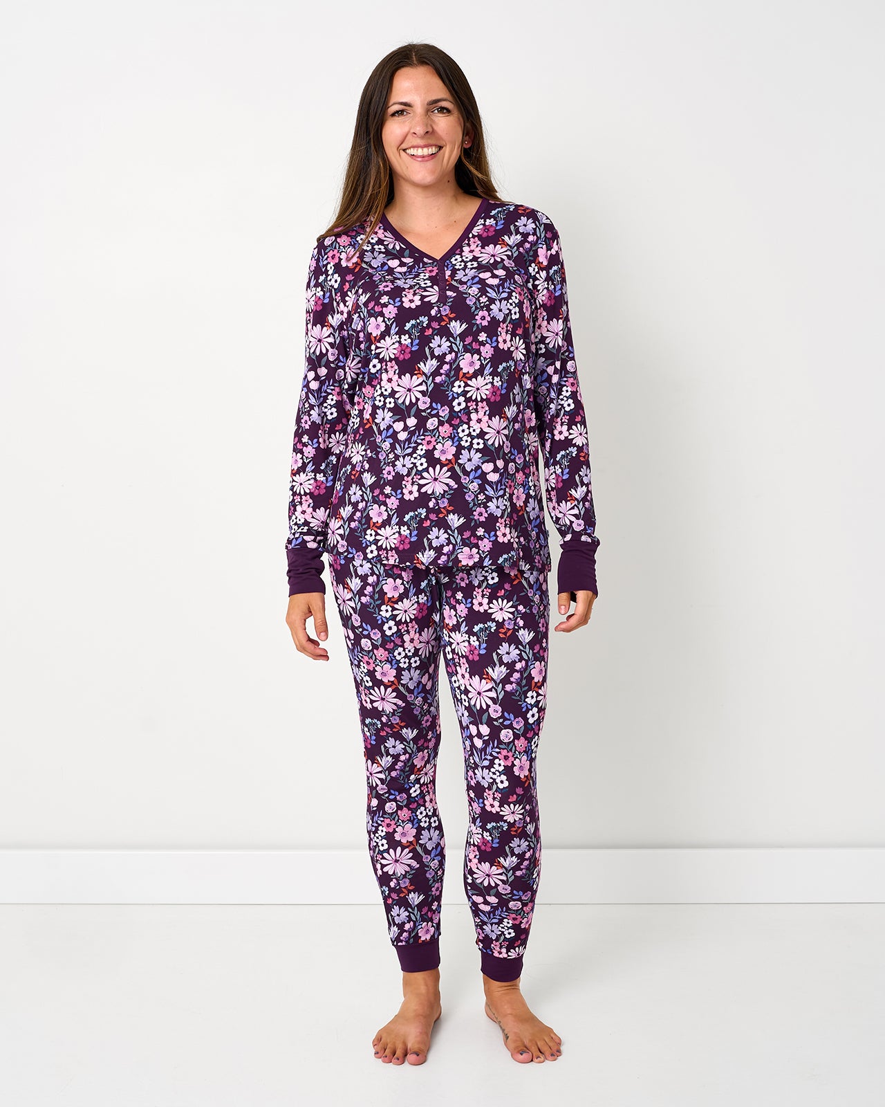 Standing woman wearing the Violet Meadow Women's Pajama Pants and matching floral top