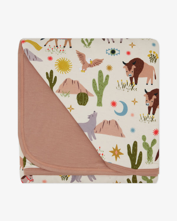 Flat lay of the Wild Frontier Large Cloud Blanket®