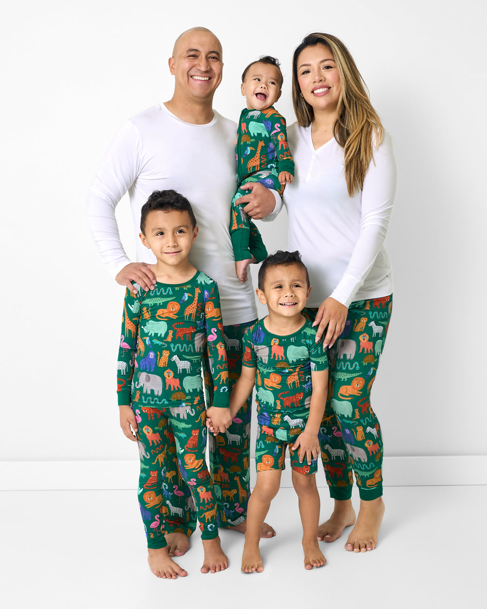Family of five wearing matching Wild Zoo Bamboo PJs