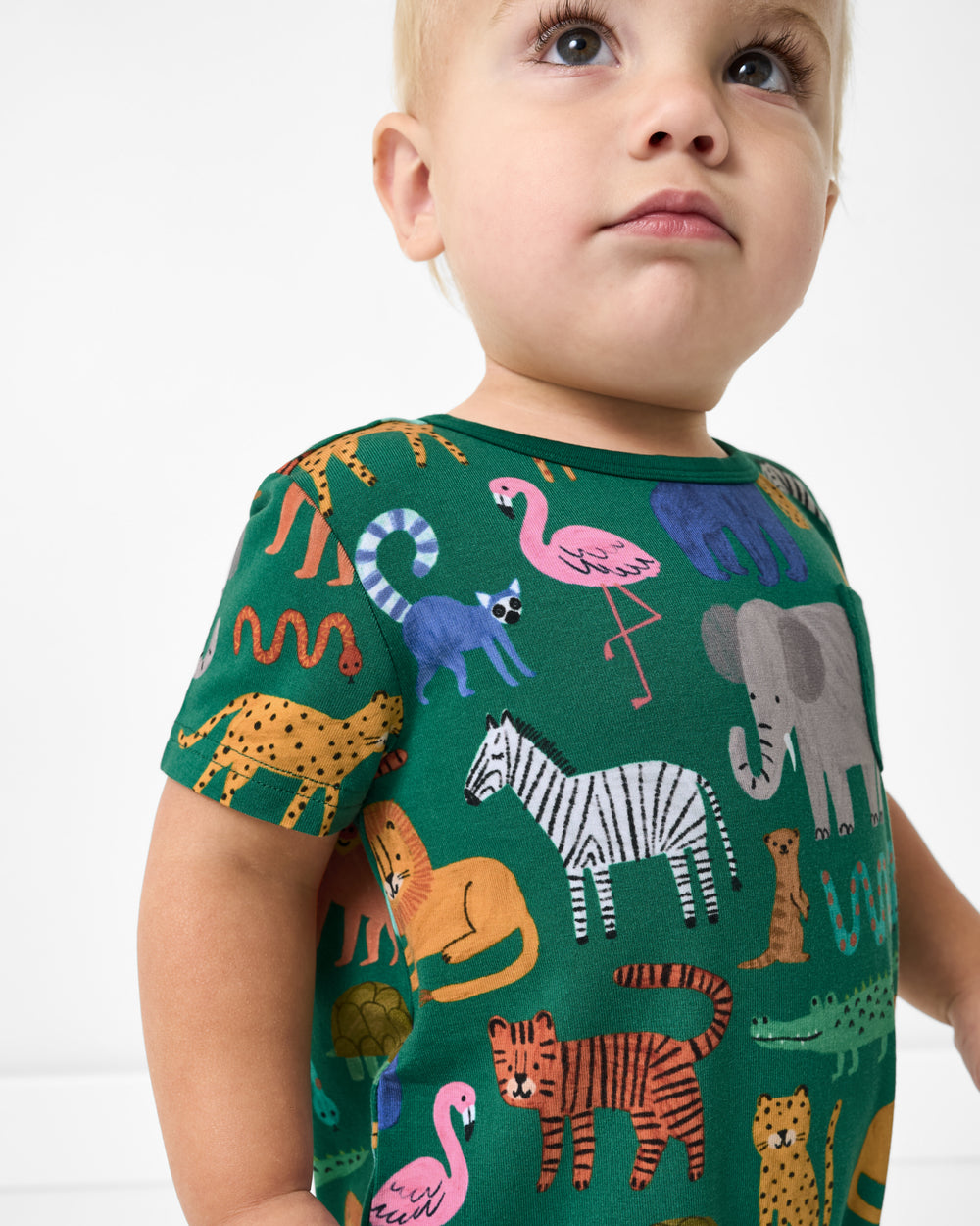 Close up of toddler wearing the Wild Zoo Pocket Shorty Romper