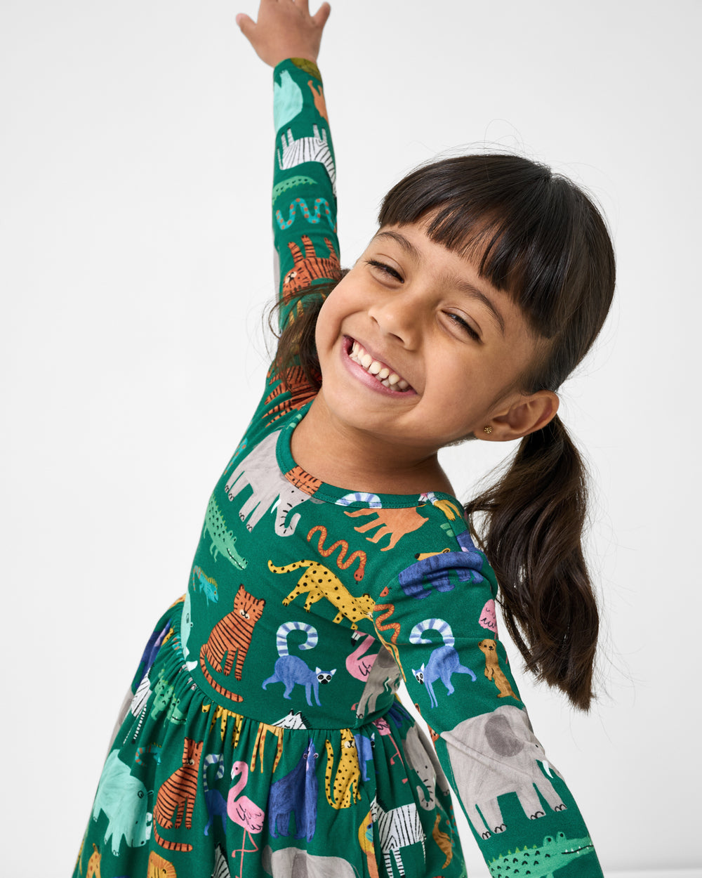Posing girl wearing the Wild Zoo Skater Dress