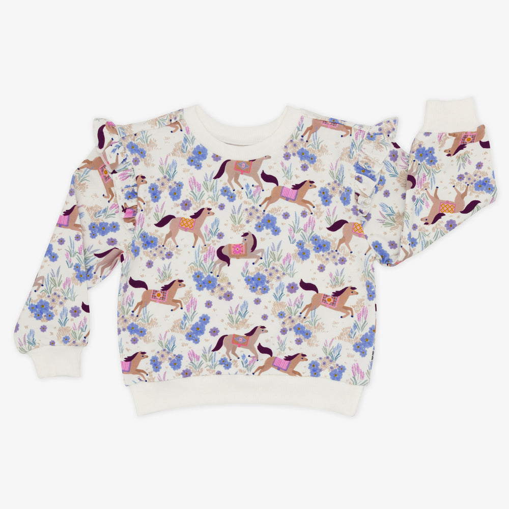 Flat lay image of the Wildflower Ride Flutter Crewneck