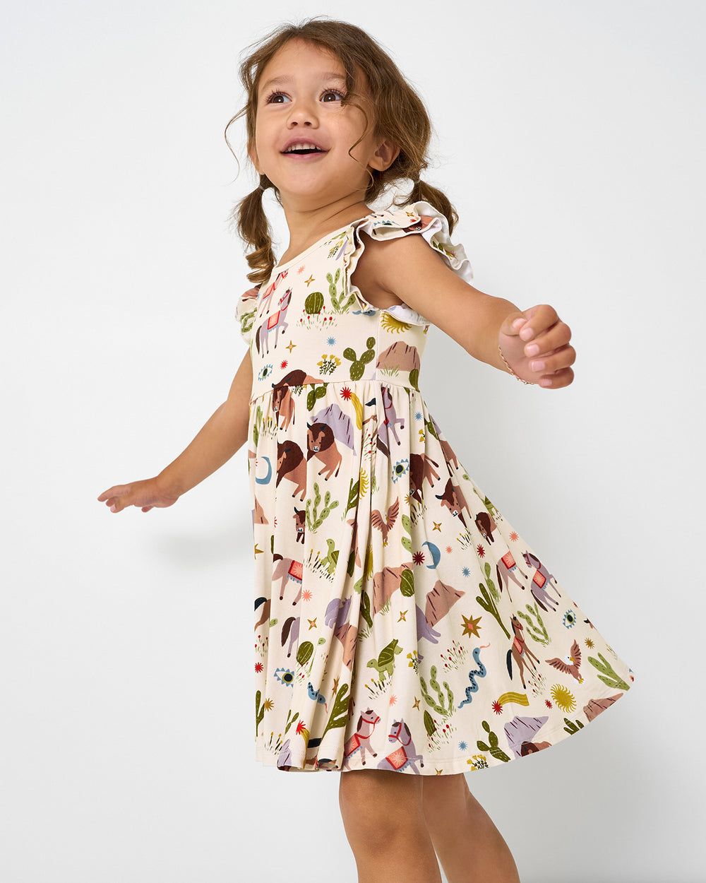 Girl wearing the Wild Frontier Flutter Twirl Dress