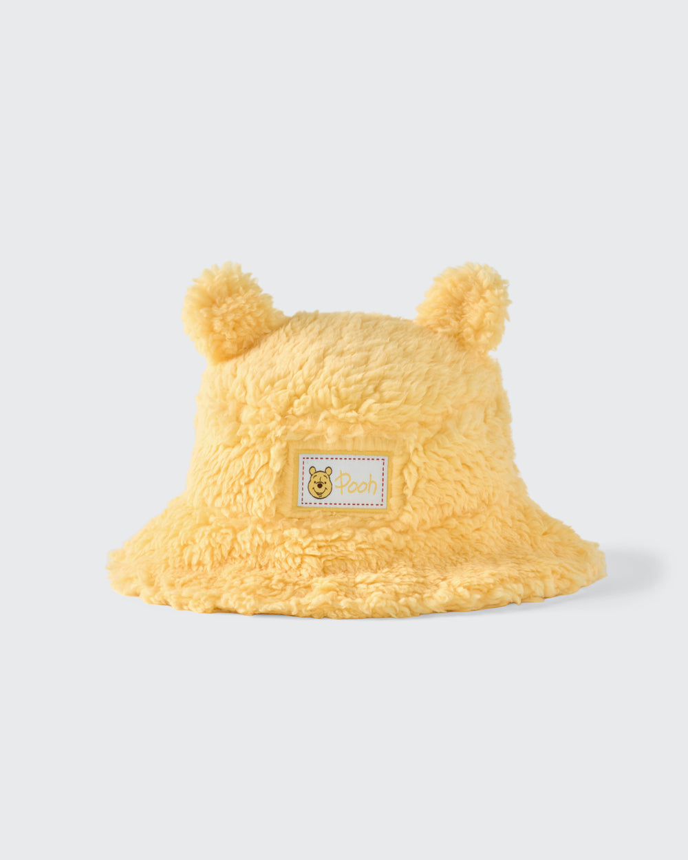 Flat lay of the Disney Winnie the Pooh Sherpa Bucket Hat