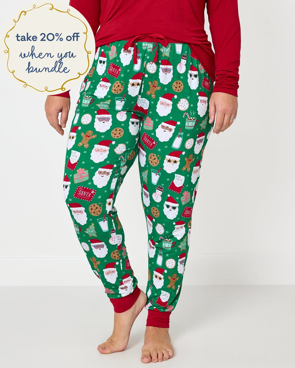 Woman wearing the Cookies for Santa Women's Pajama Pants with a holiday red pj top