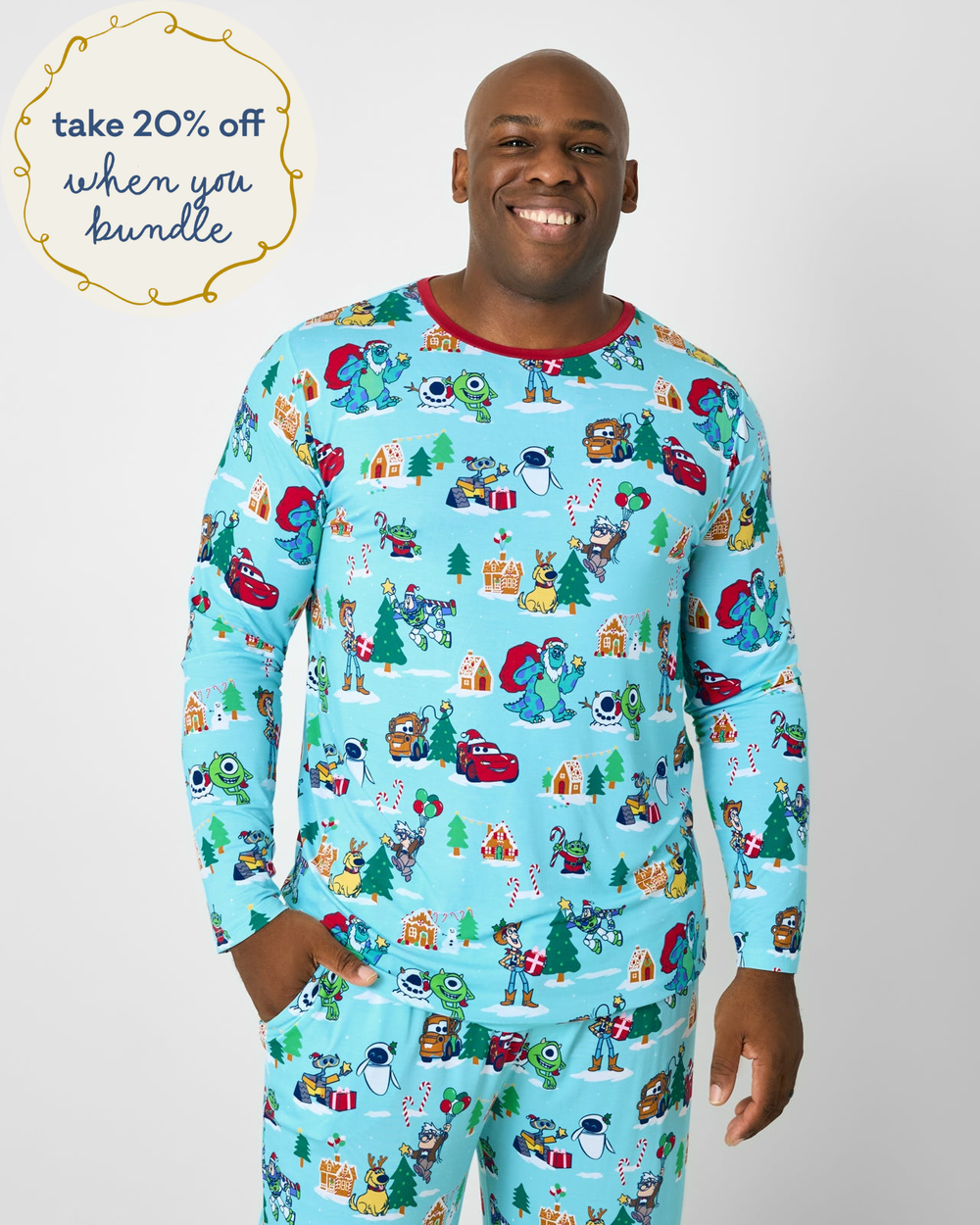 Man wearing the Disney & Pixar Christmas Village Men's Long Sleeve Pajama Top