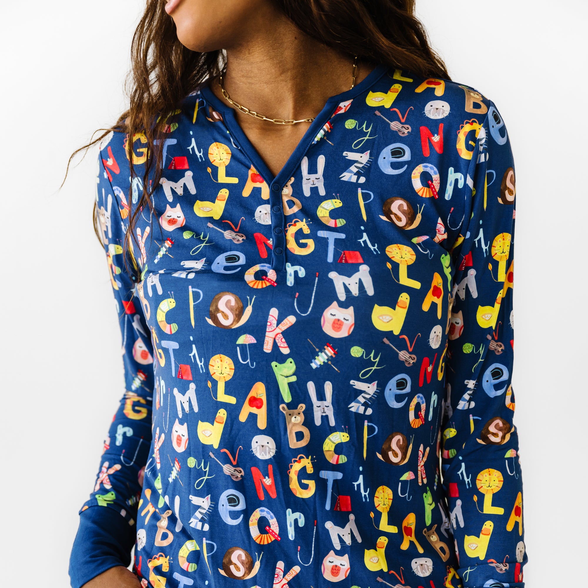 Close up image of a woman wearing Navy Alphabet friends women's Pj top