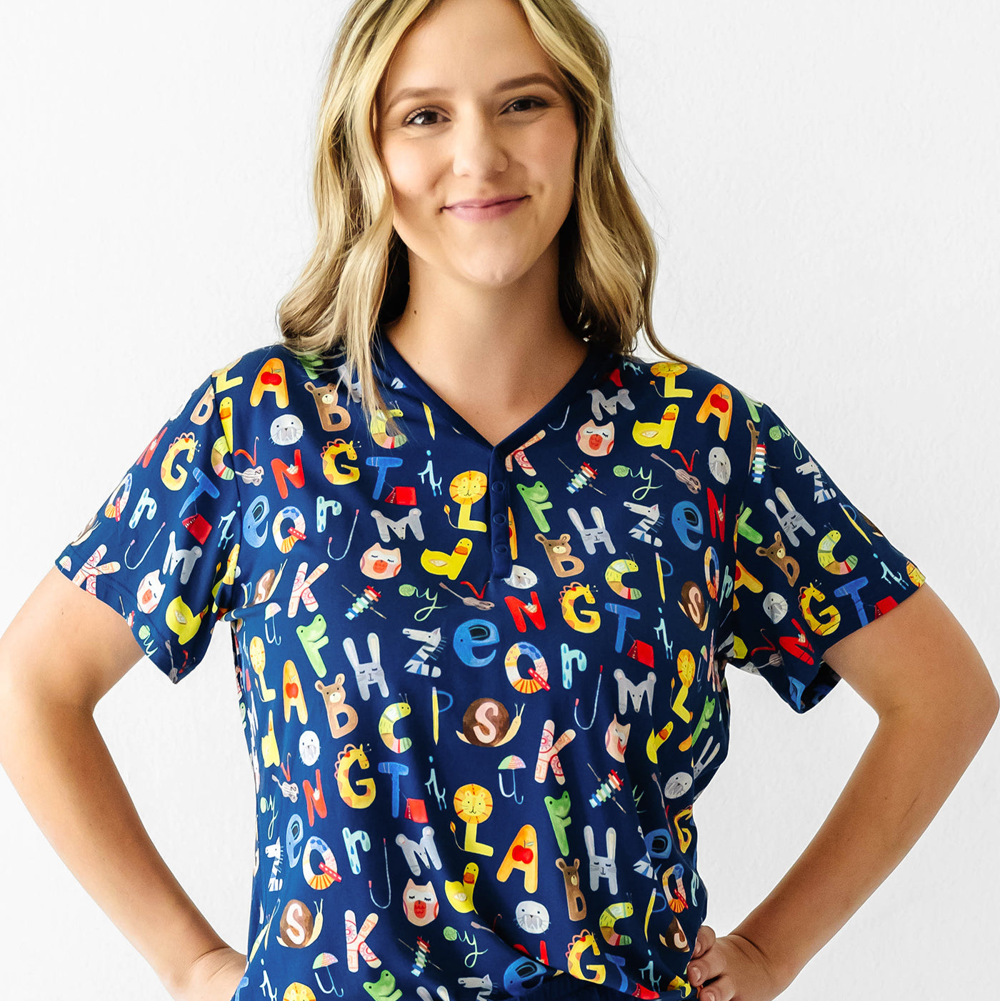 Close up image of a woman wearing women's Alphabet Friend short sleeve pj top