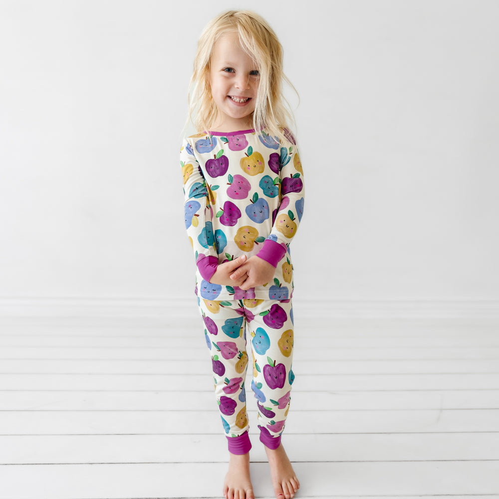 Child wearing a Berry Apple of my Eye two piece pajama set