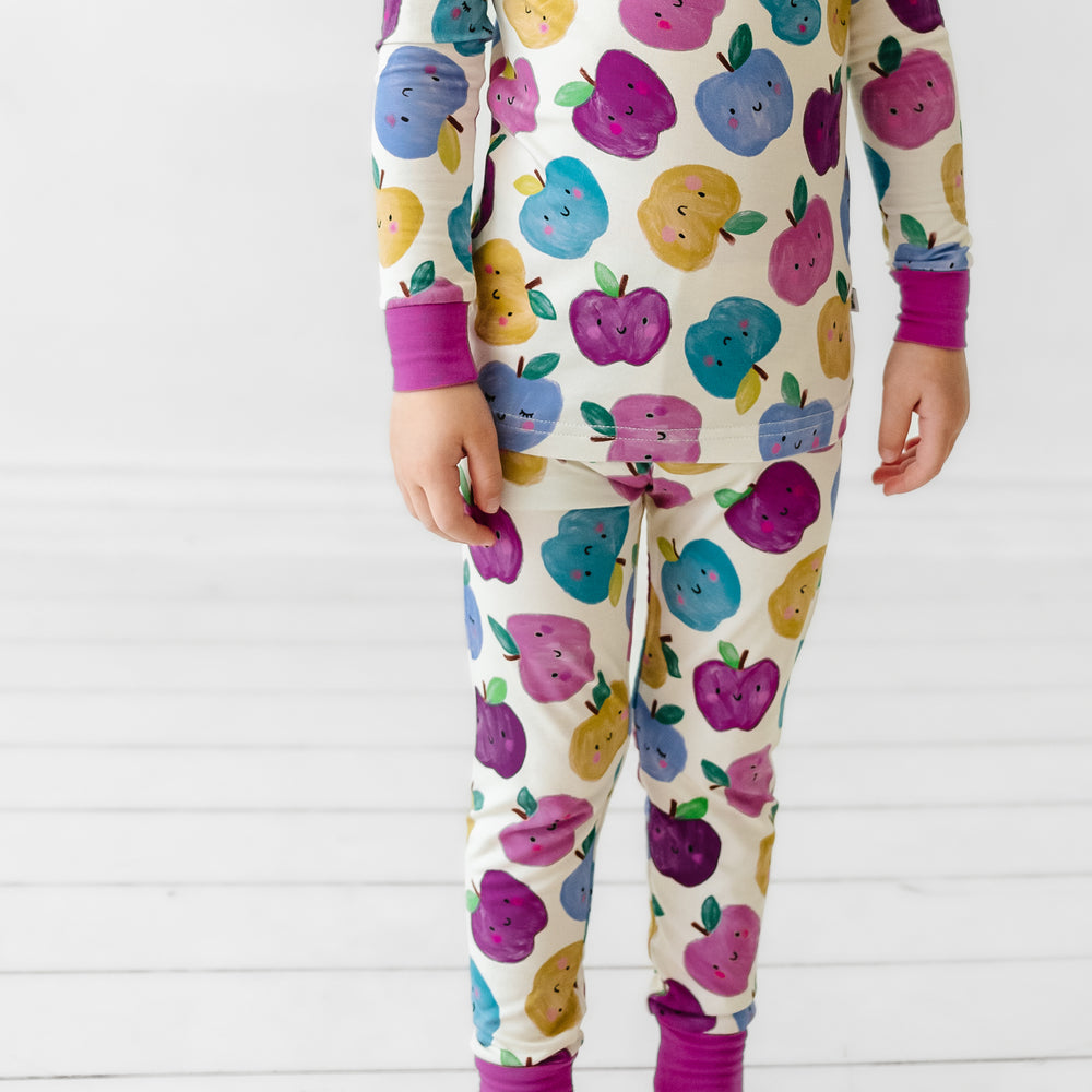 Alternate close up image of a child wearing a Berry Apple of my Eye two piece pajama set