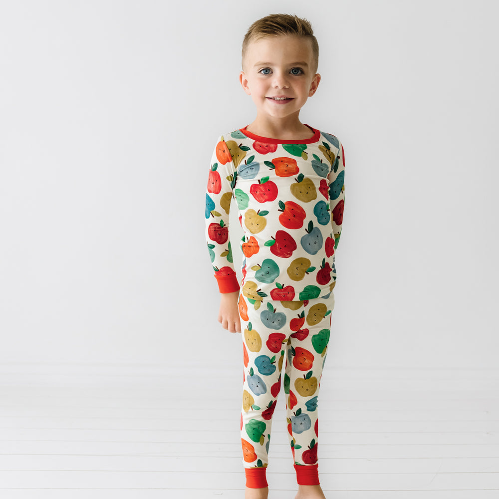 Child wearing a Red Apple of My Eye two piece pajama set