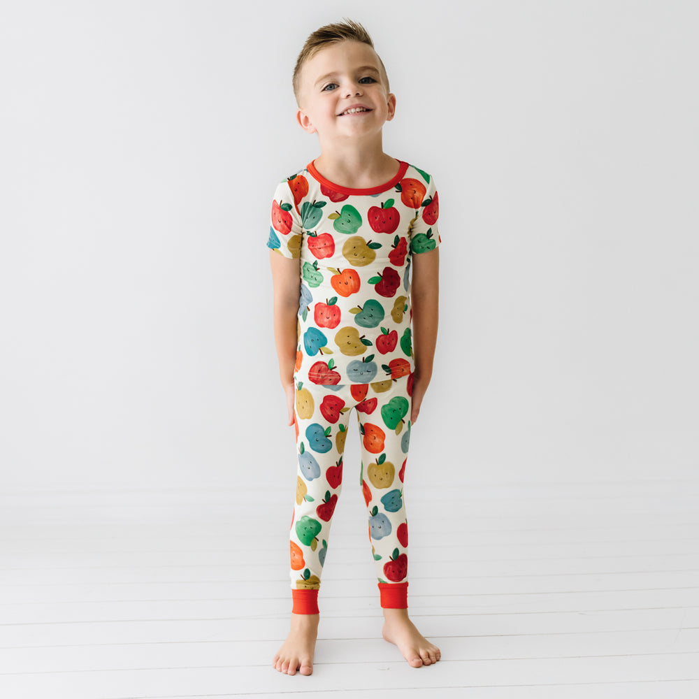 Child wearing a Red Apple of My Eye two piece short sleeve pajama set