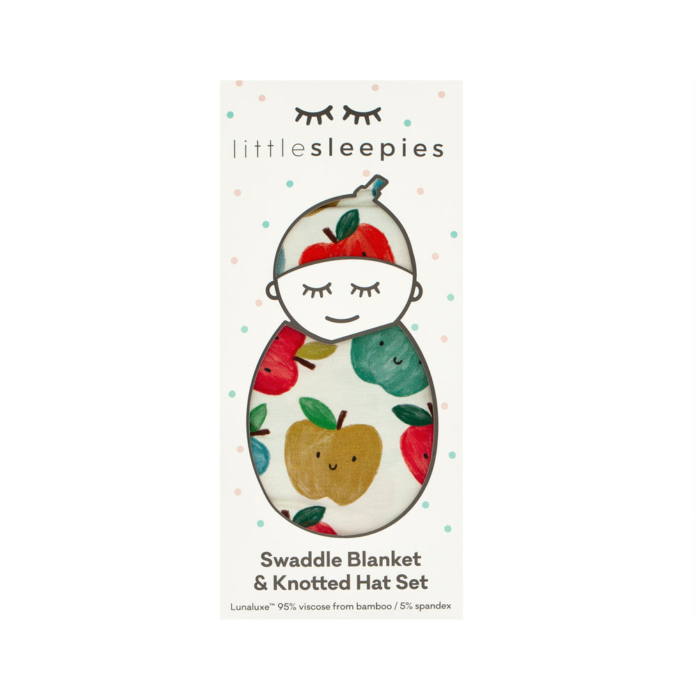 Click to see full screen - Red Apple of My Eye swaddle and hat set in Little Sleepies peek-a-boo packaging