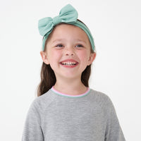 Alternate image of a child wearing an Aqua Mist luxe bow headband