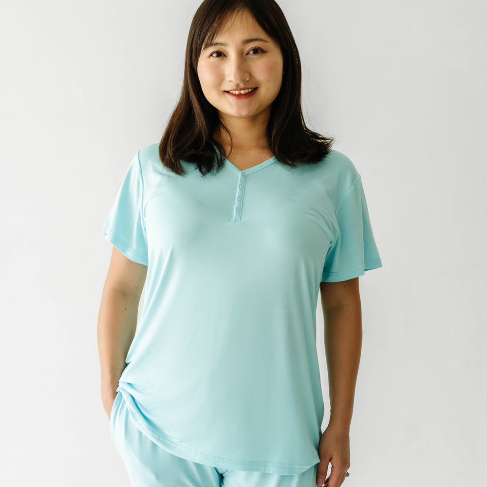 Woman wearing an Aquamarine women's short sleeve pajama top