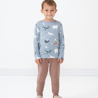 Child wearing an Arctic Animals printed pocket tee and coordinating Light Cocoa joggers