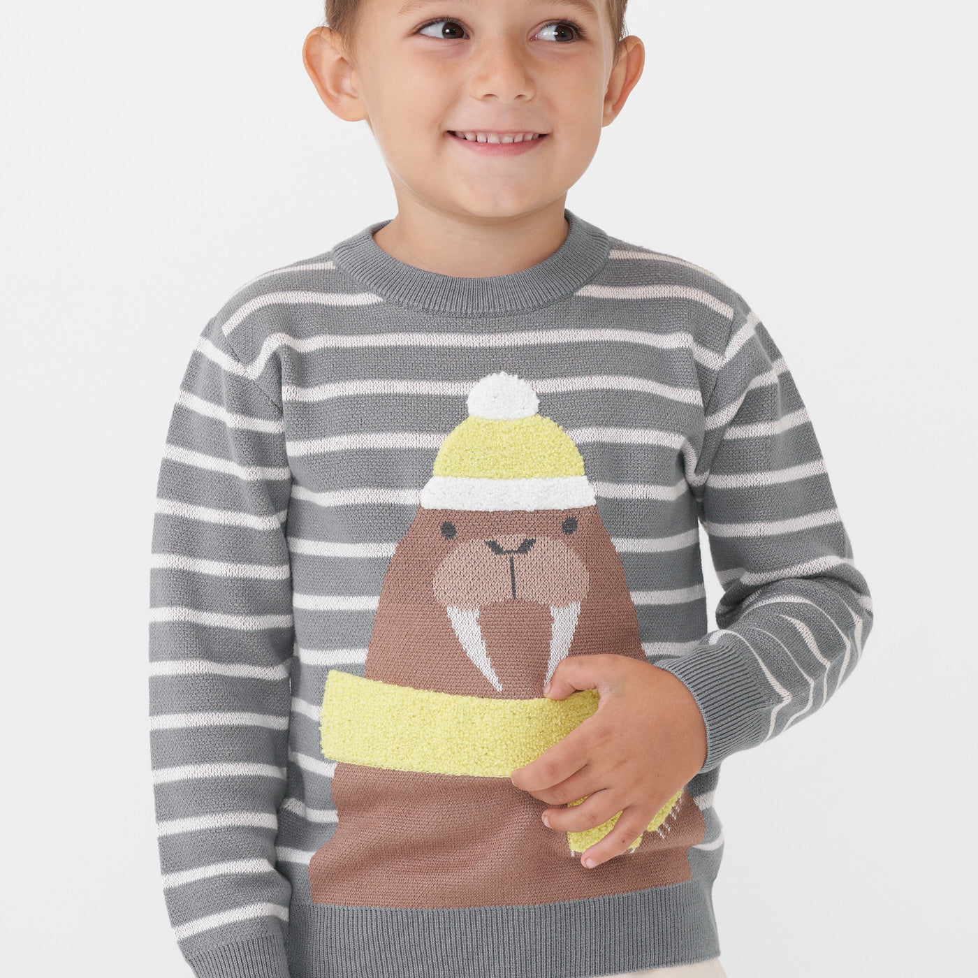 Alternate close up image of a child wearing a Walrus knit sweater