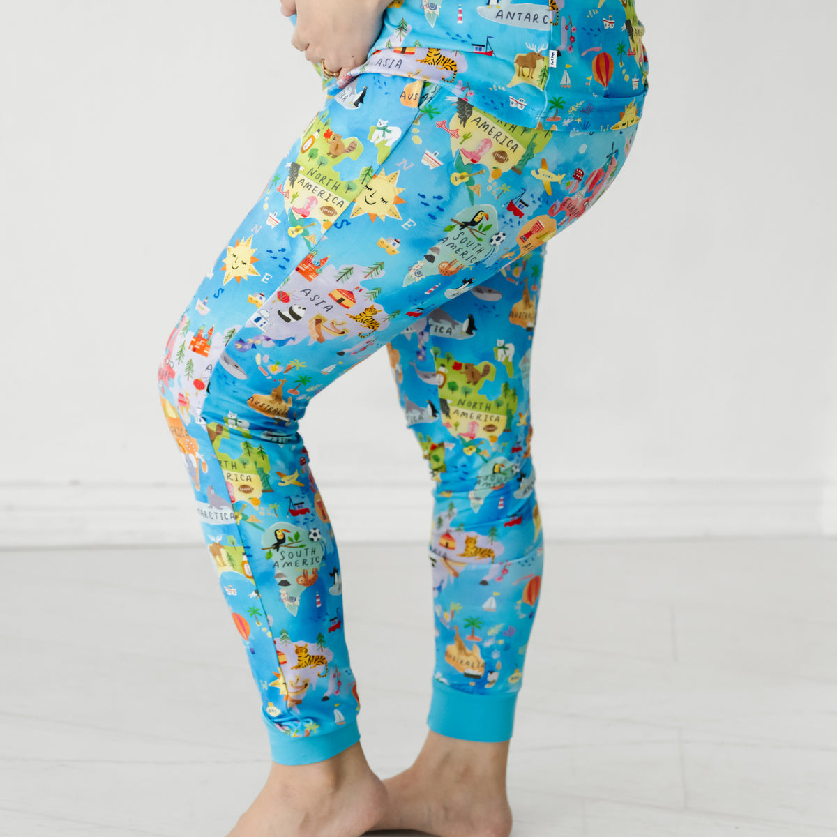 Close up profile view of a woman wearing Around the World bamboo women's pajama pants