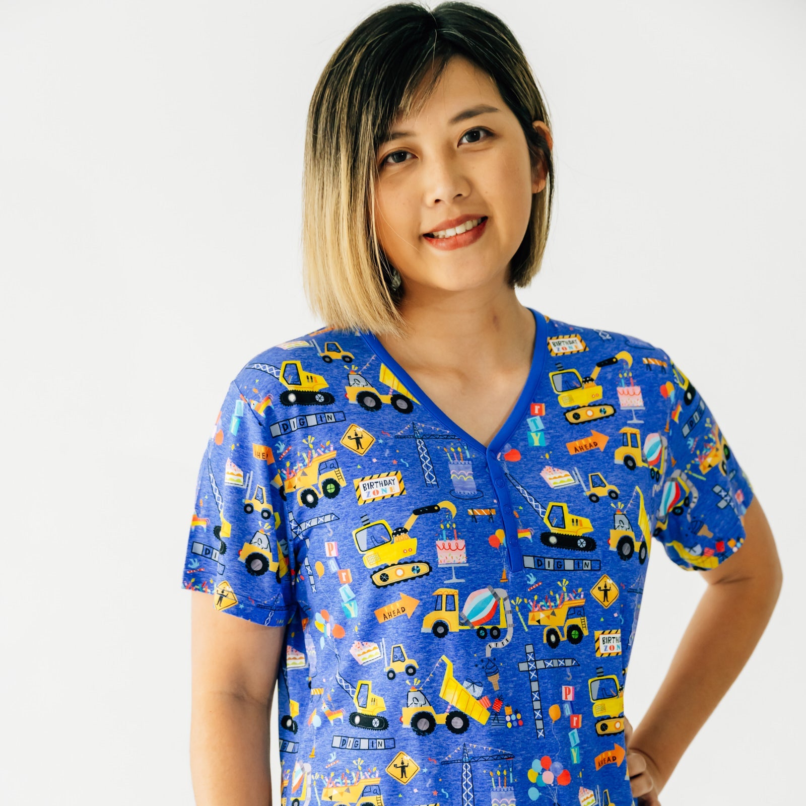 Close up of a woman wearing a Birthday Builders Women's Short Sleeve Pajama Top