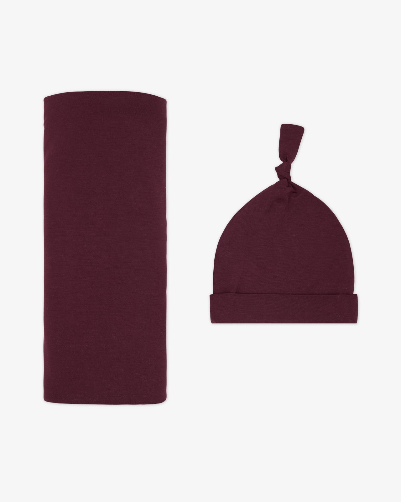 Flat lay of the Classic Burgundy Swaddle & Hat Set