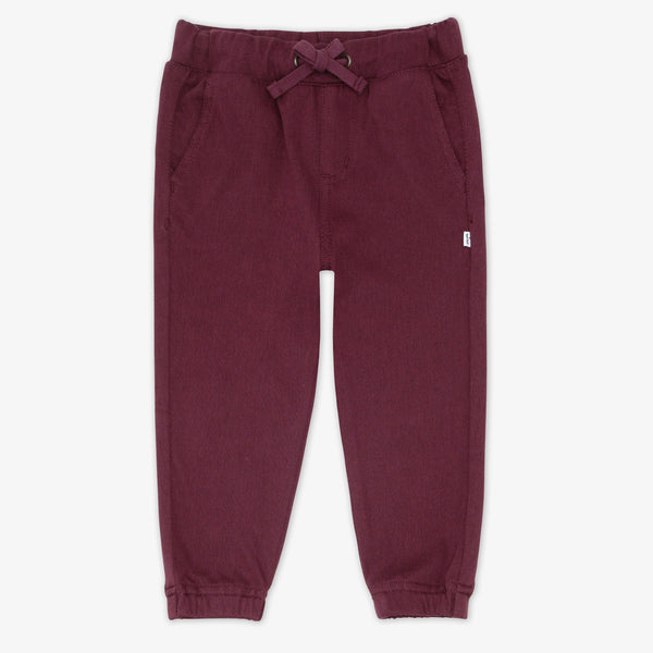 Flat lay image of the Classic Burgundy Denim Jogger