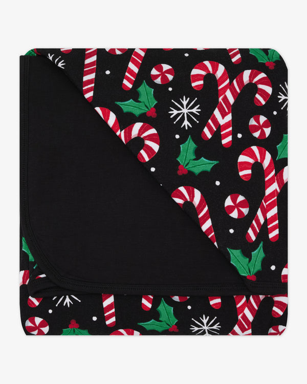 Flat lay of the Merry Mints Large Cloud Blanket®