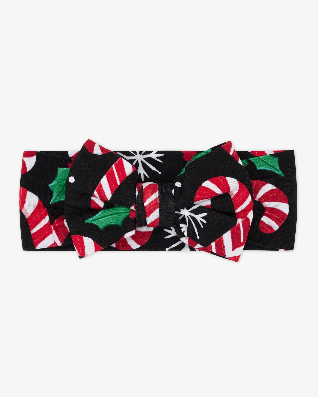 Flat lay of the Merry Mints Luxe Bow Headband