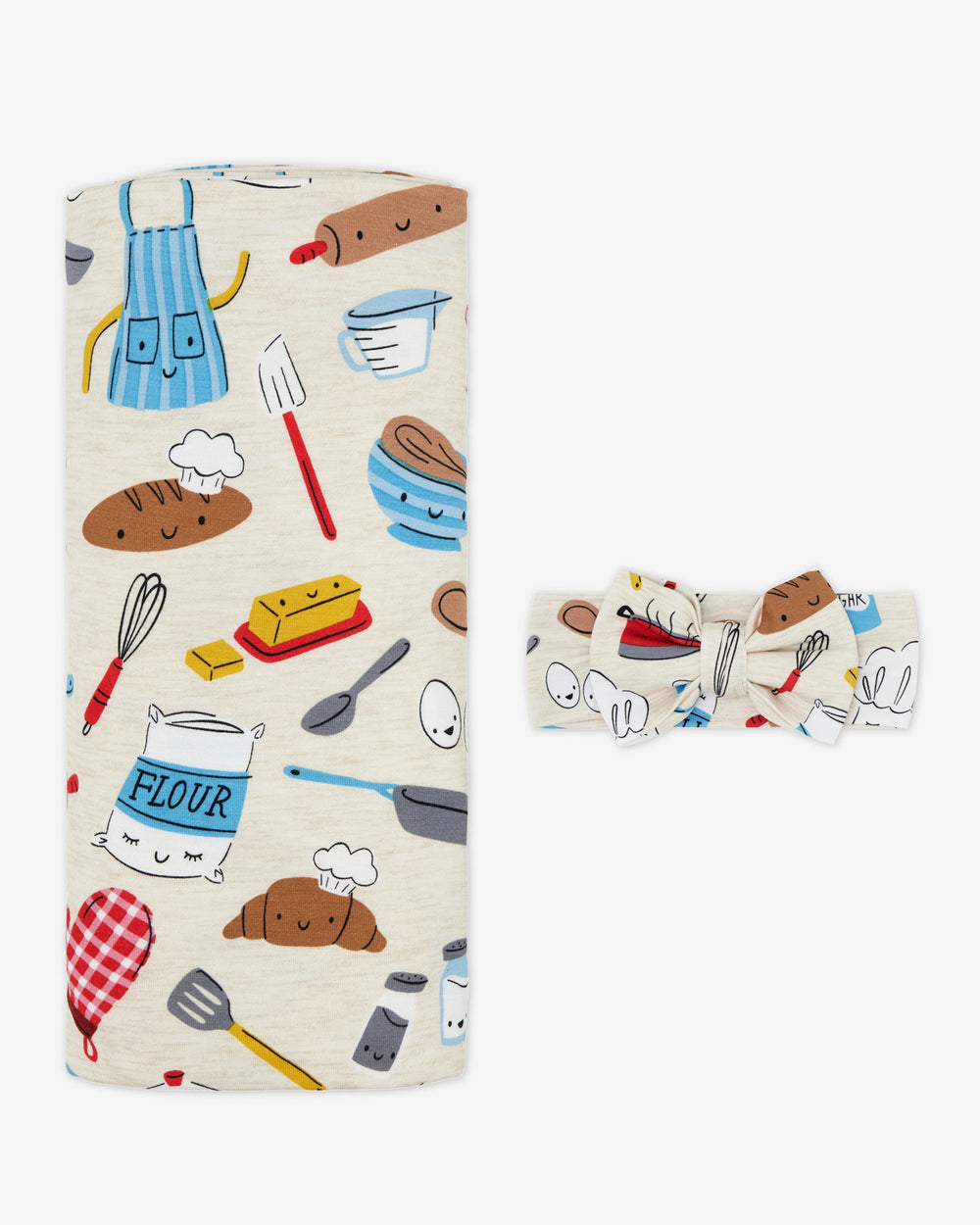 Flat lay of the Little Chef Swaddle & Luxe Bow Headband Set