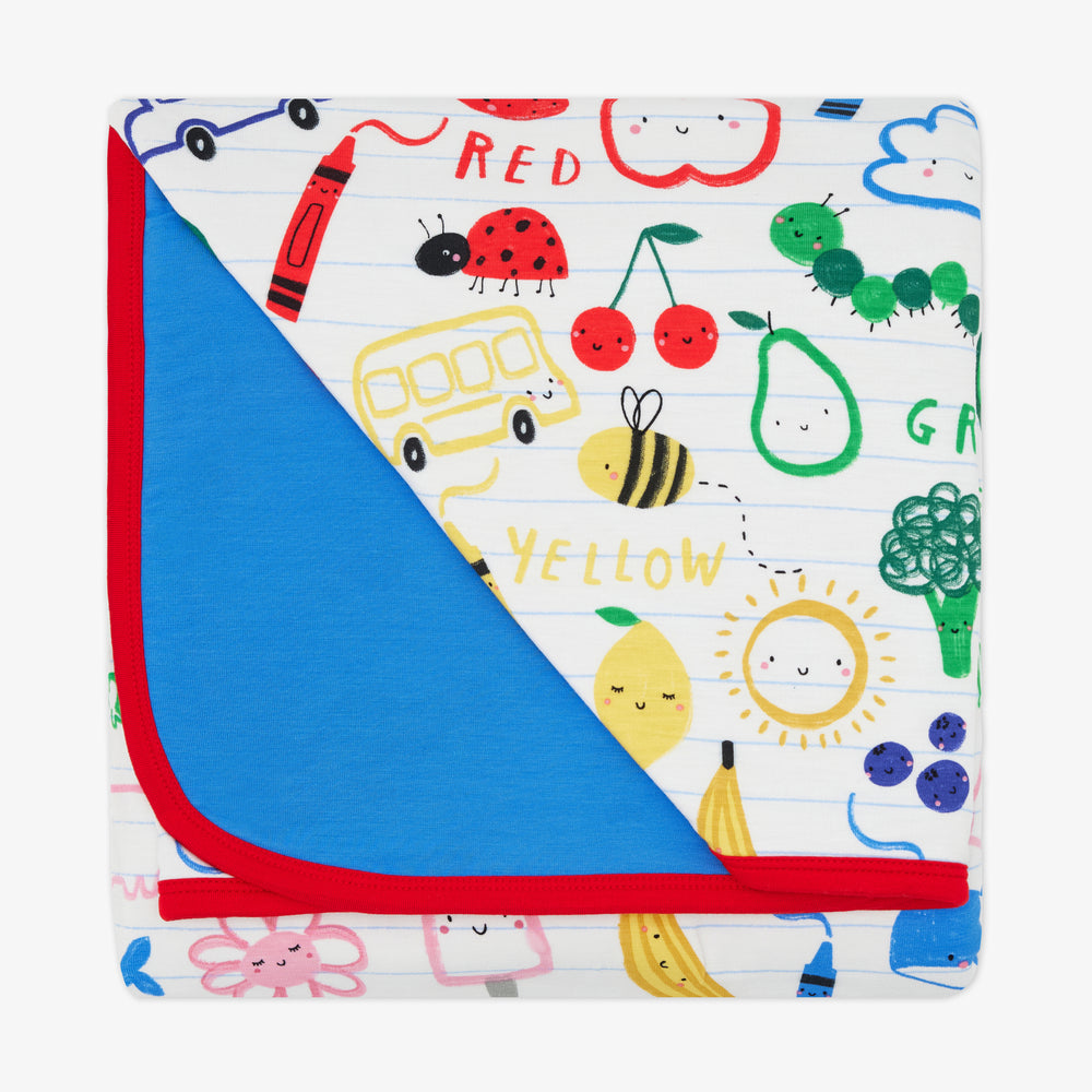 Flat lay of the Coloring Crew Large Cloud Blanket®