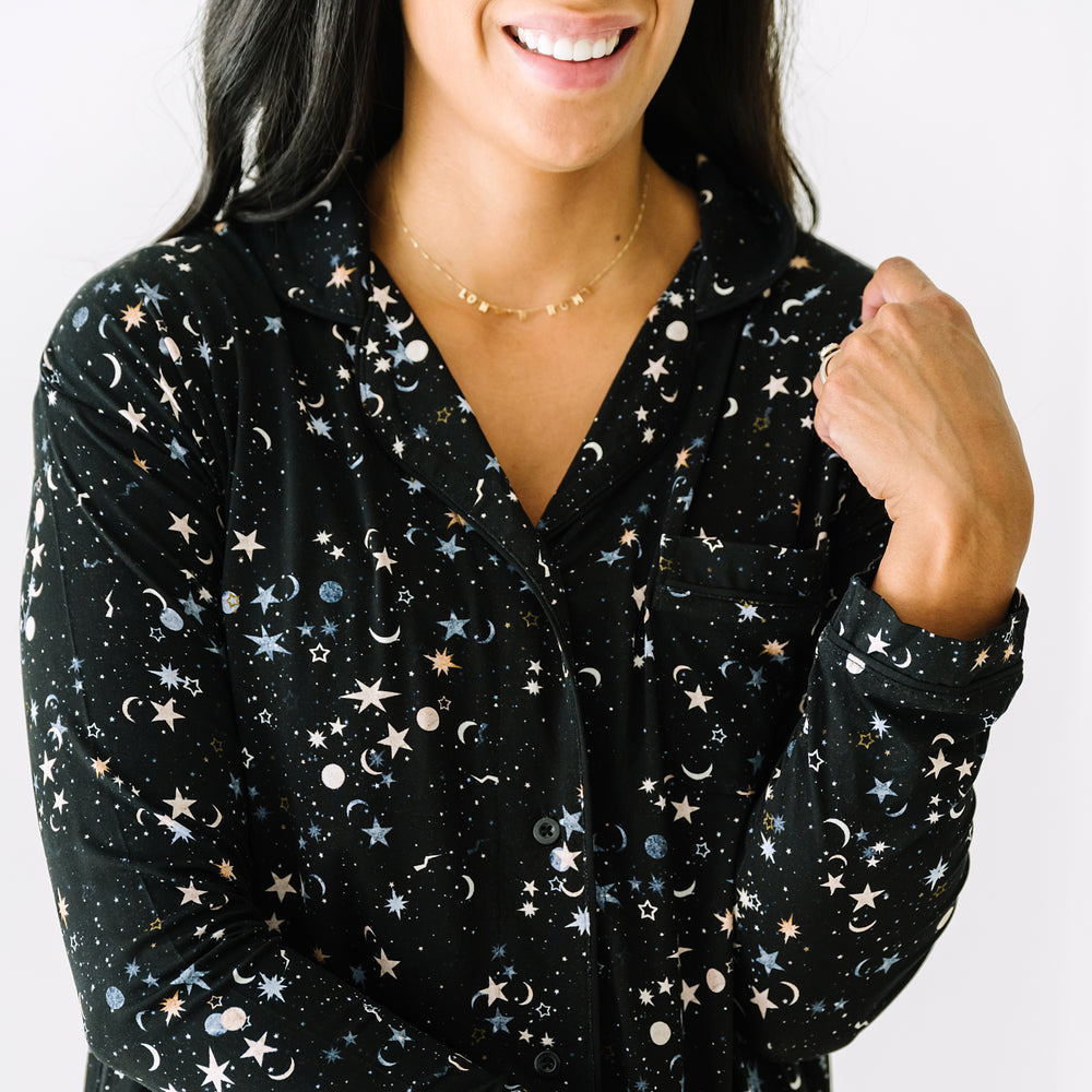 Close up image of a woman wearing a Counting Stars printed women's sleep shirt