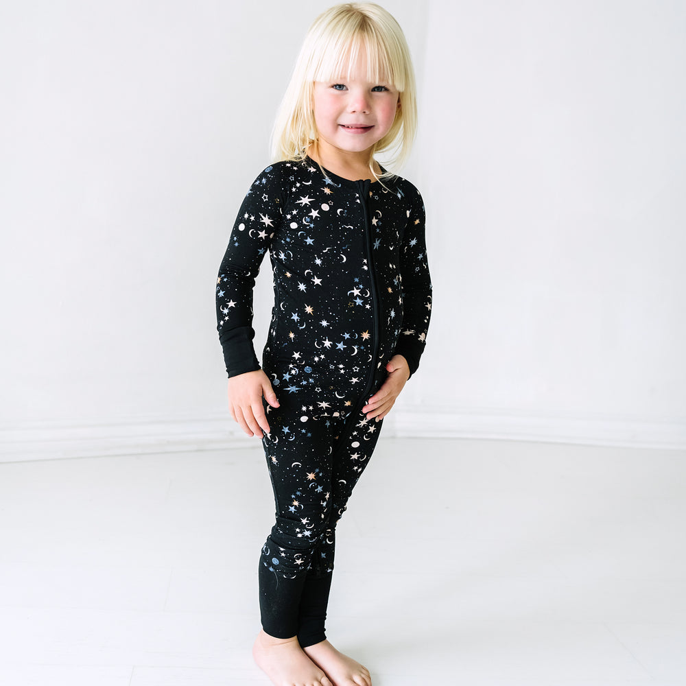 Child wearing a Counting Stars printed zippy
