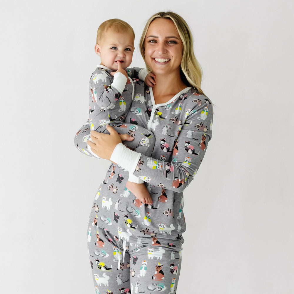 Woman and child wearing matching Cozy Cats pajamas