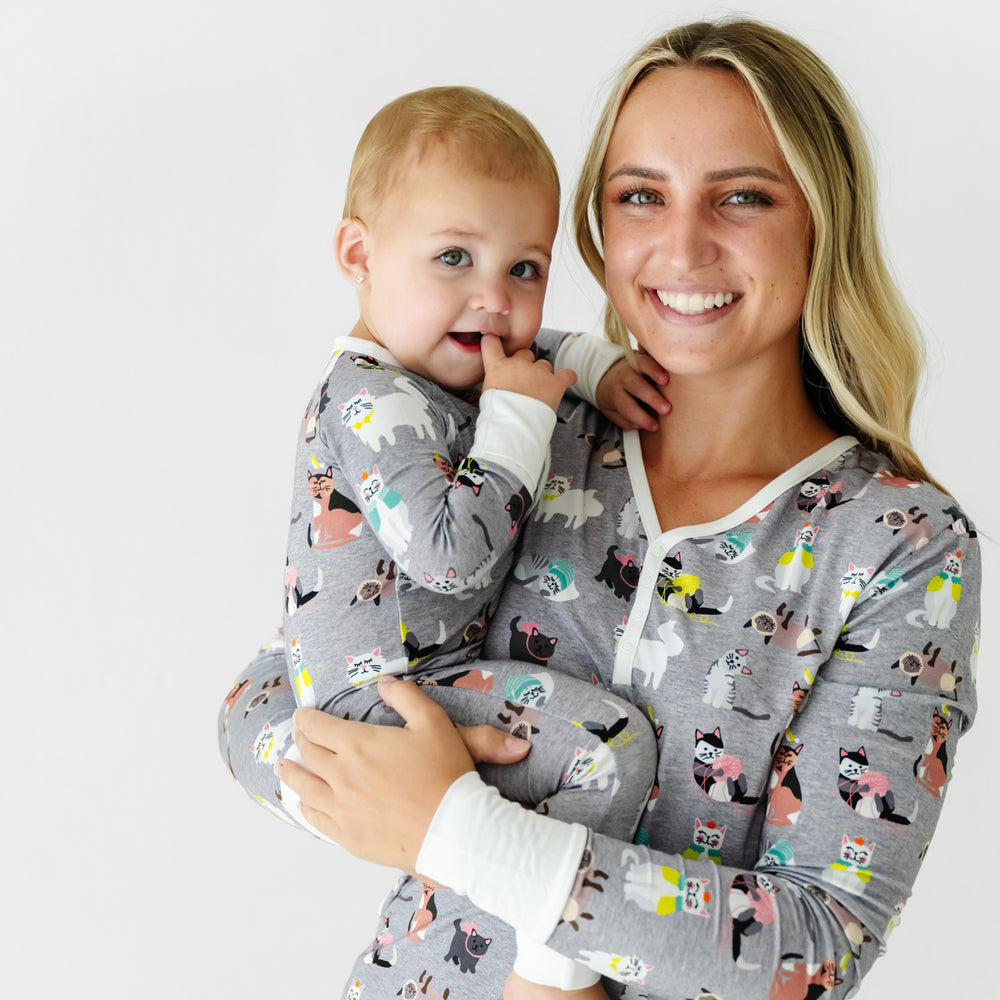 Mother and child wearing matching Cozy Cats pajamas