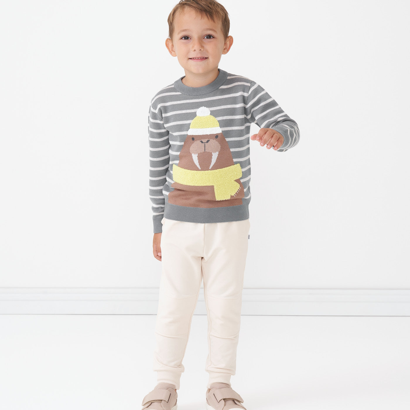Child wearing Cream Joggers and coordinating Walrus knit sweater