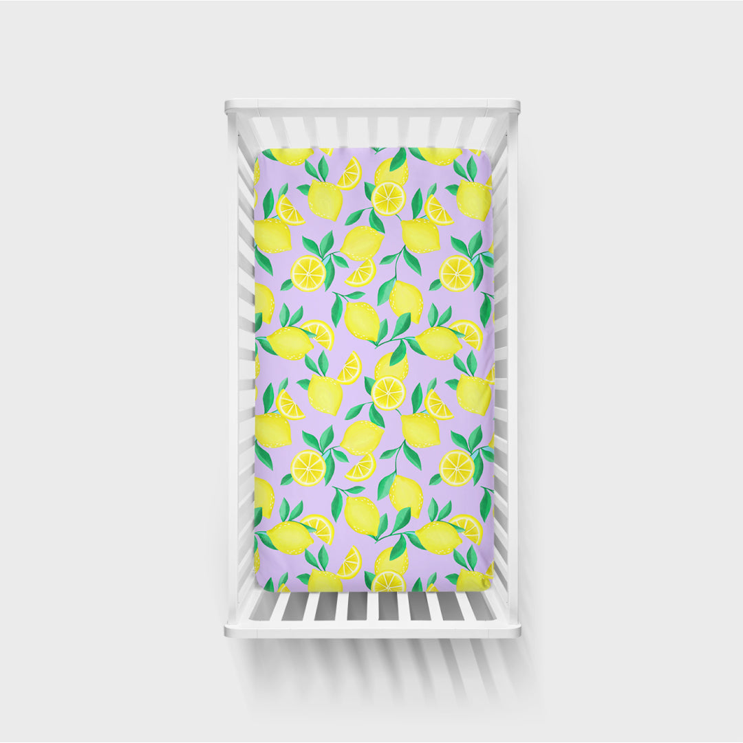 Aerial view of the Lavender Sunny Citrus Fitted Crib Sheet