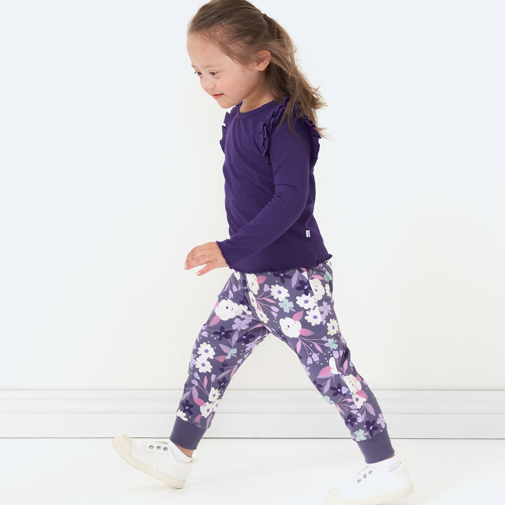 Alternate image of a child wearing a Deep Amethyst ribbed flutter lettuce tee and coordinating Sugar Plum Floral joggers