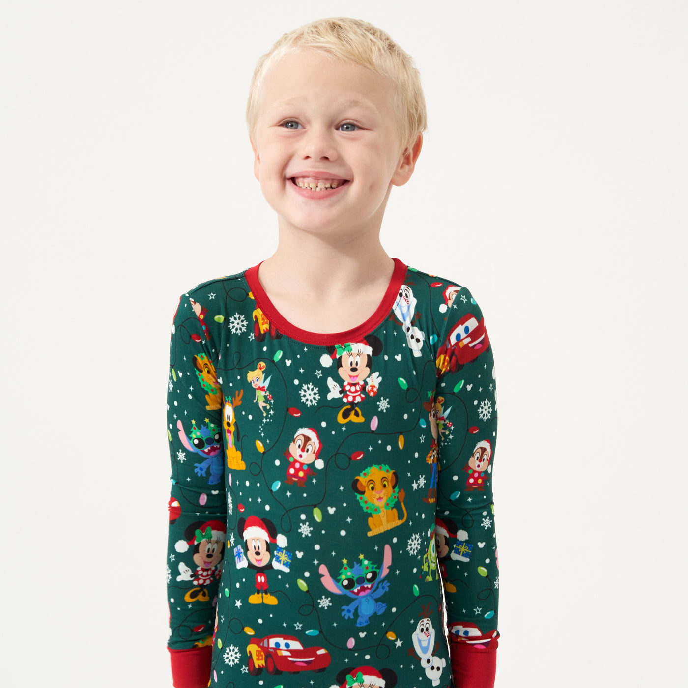 Alternate close up image of a child wearing a Disney Christmas Party two piece pajama set