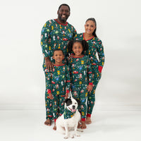 Dog and family wearing matching Disney Christmas Party Pet Bandana and pajamas