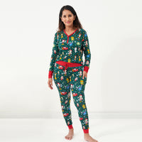 Woman wearing Disney Christmas Party women's pajama pants and matching top