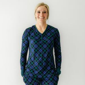 Close up image of a woman wearing an Emerald Plaid women's pajama top