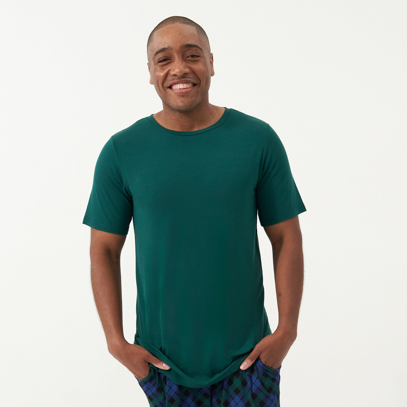Man wearing an Emerald men's short sleeve pajama top and coordinating pants