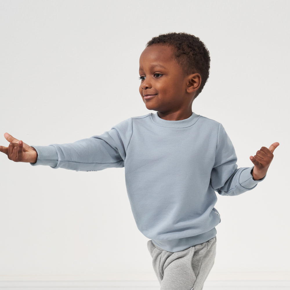 Alternate image of a child wearing a Fog elbow patch crewneck