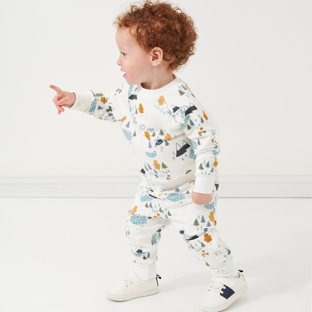 Alternate image of a child wearing a Let's Explore printed crewneck sweatshirt and matching joggers