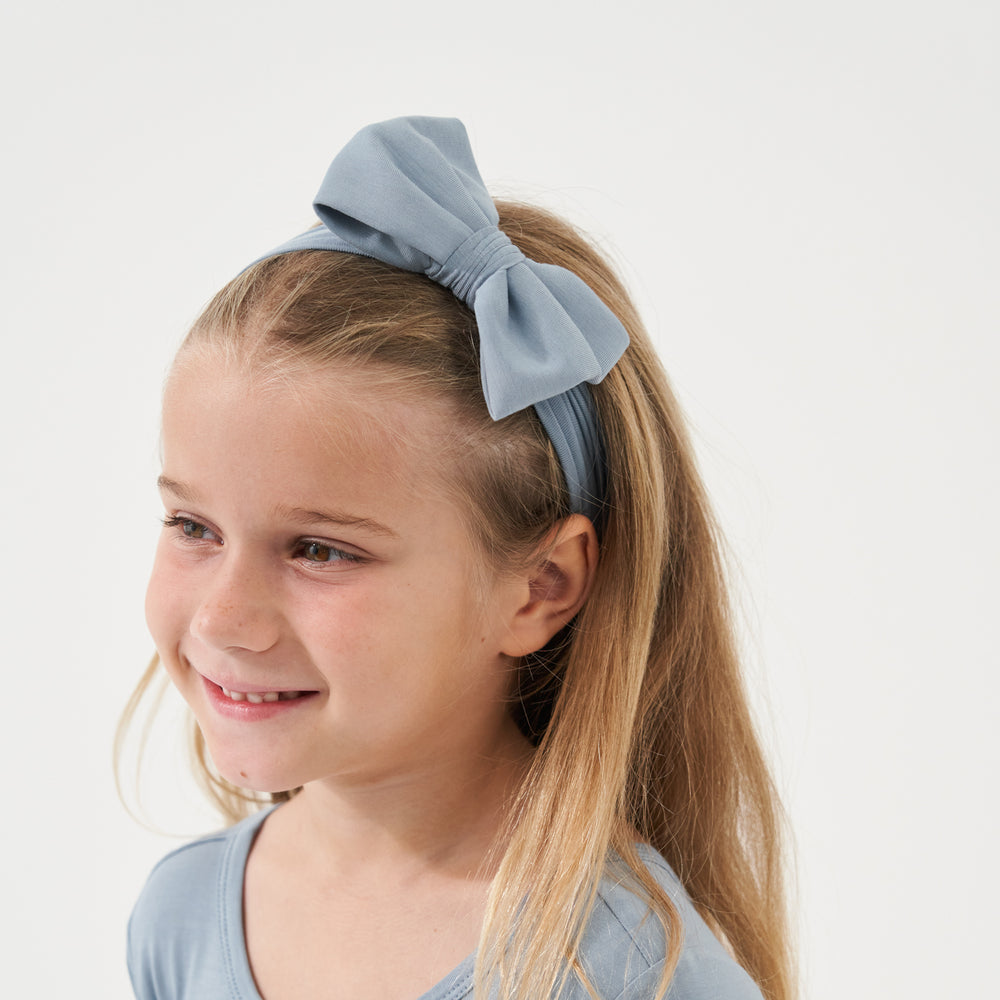 Click to see full screen - Child wearing a Fog luxe bow headband