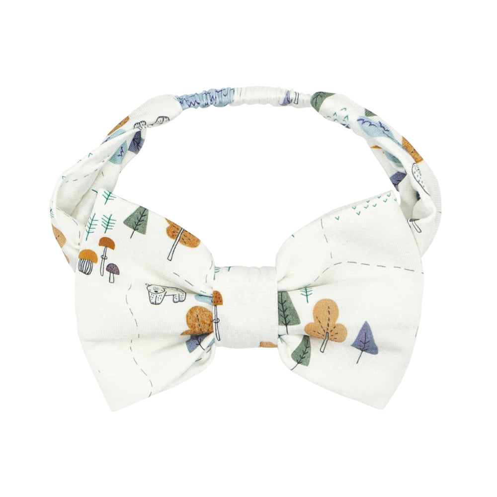 Click to see full screen - Alternate flat lay image of a Let's Explore printed luxe bow headband