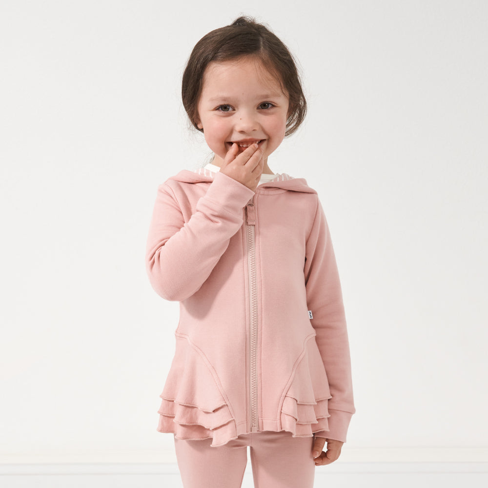 Click to see full screen - Child wearing a Mauve Blush peplum hoodie
