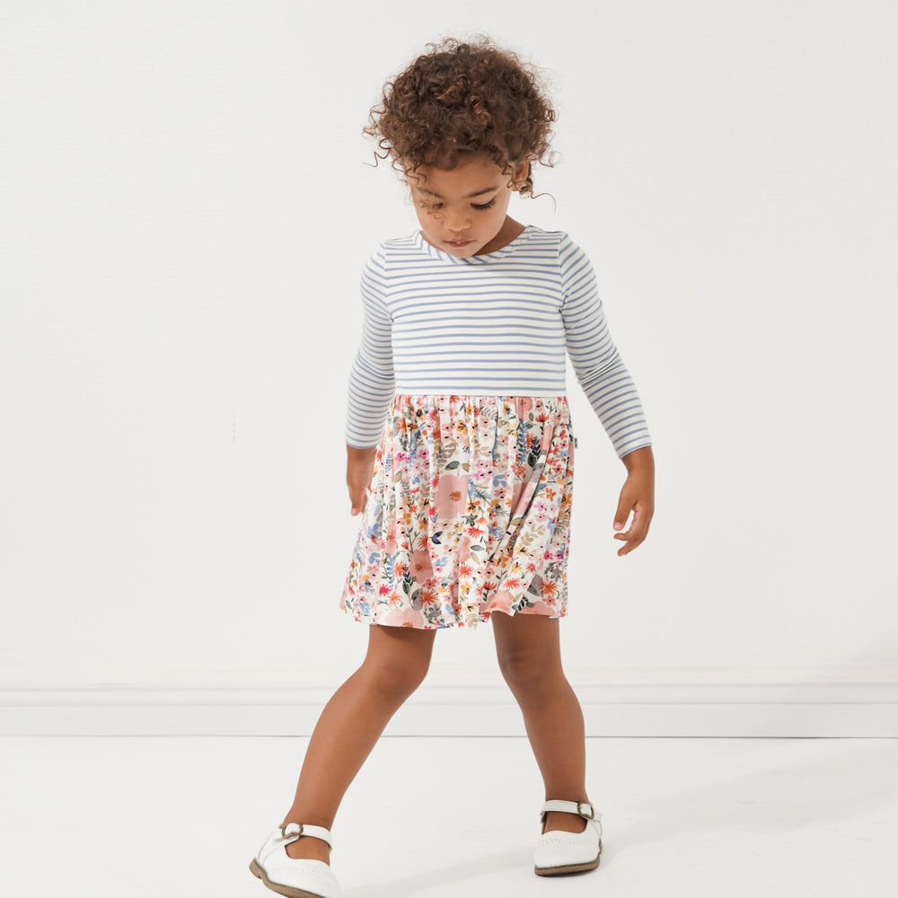 Alternate image of a child playing wearing an Ivory and Fog and Mauve Meadow skater dress with bodysuit